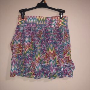 3/🔟 Mini ruffled multicolored skirt